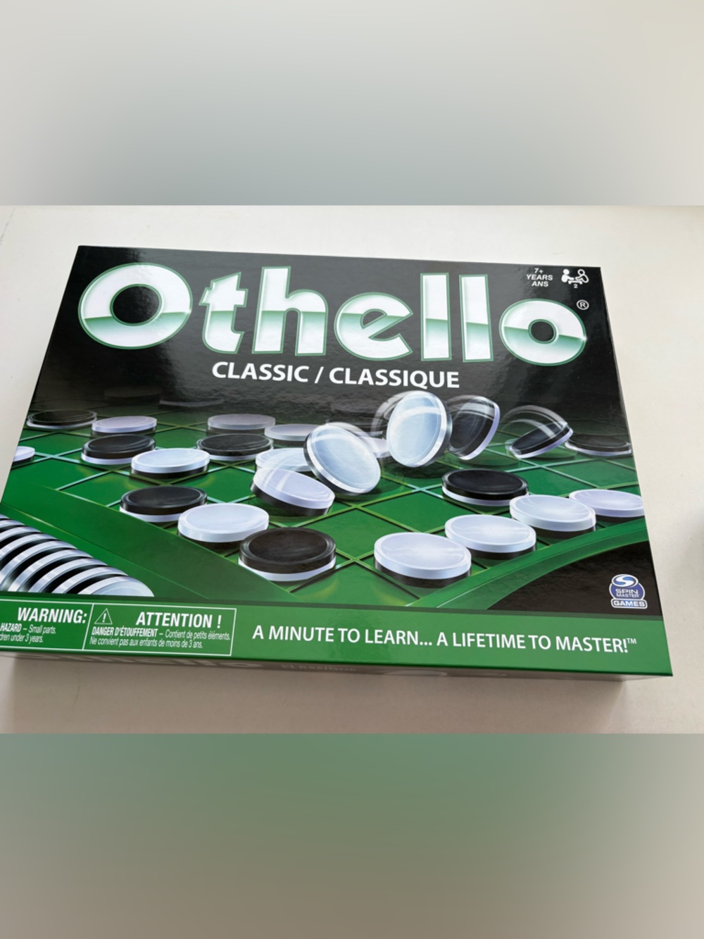 Othello Strategy Game - Black & White Pieces with Green Board